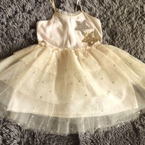 LITTLE PRINCESS Charming little girls’ cream-colored tulle dress